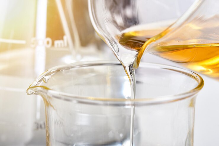 Oil pouring Laboratory and science experiments Formulating the chemical for medical research Quality control of petroleum industry products concept