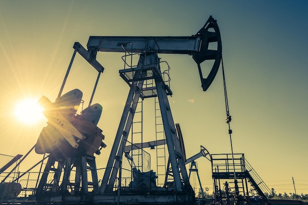 oil pumpjack, industrial equipment. rocking machines for power generation. extraction of oil. petroleum concept.