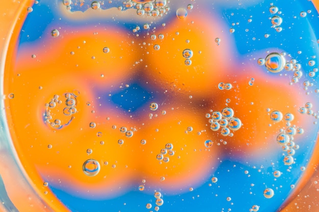 Oil on water - abstract macro background.