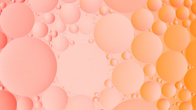 추상 핑크 컬러 그라데이션 배경의 물 매크로 사진에 기름