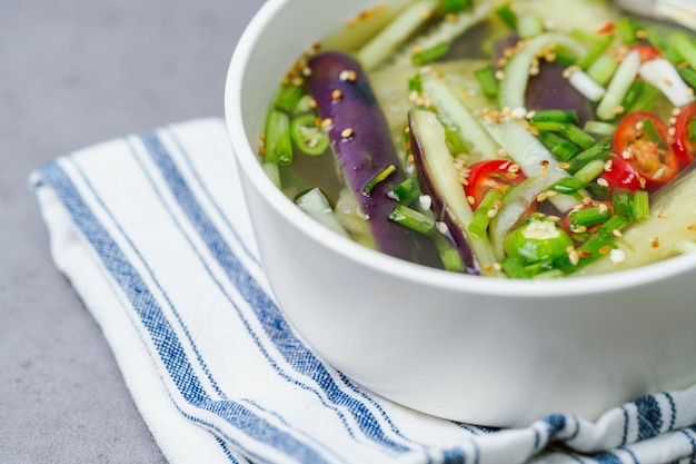 Oinaengguk Korean Chilled Cucumber Soup prepared with julienned seasoned cucumber in a cool broth made with soy sauce garlic and vinegar It is a popular summer dish
