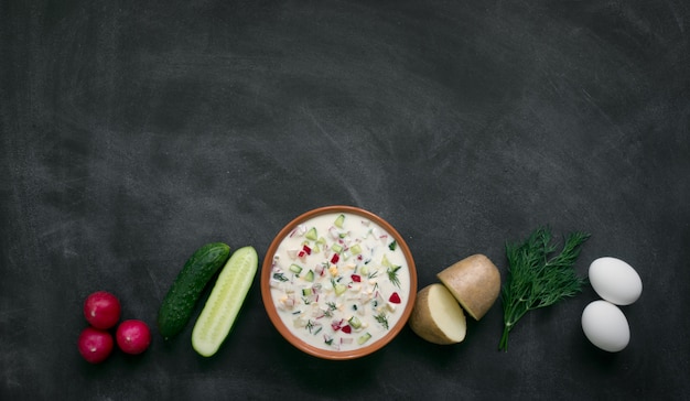 Okroshka. Traditional russian summer yoghurt cold soup with vegetables. 