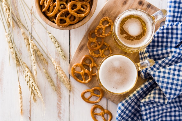 Oktoberfest beer and pretzel top view