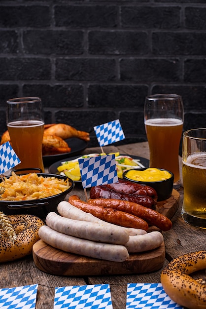 Oktoberfest dishes with beer pretzel and sausage