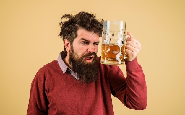 Oktoberfest festival bearded man drinking craft draught beer drunk bearded man with mug of beer