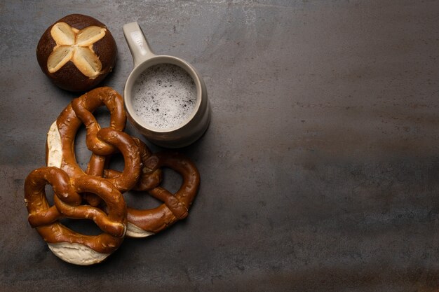 oktoberfest food pretzels and of beer on textured background