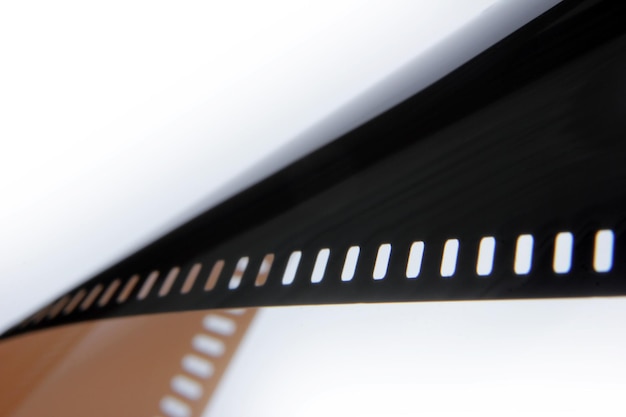 Old 35 mm film strip on a white background