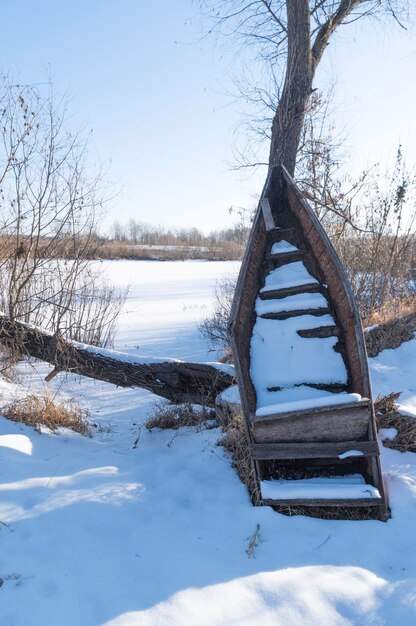 Old abandoned boat Boat without a fisherman Vertical frame