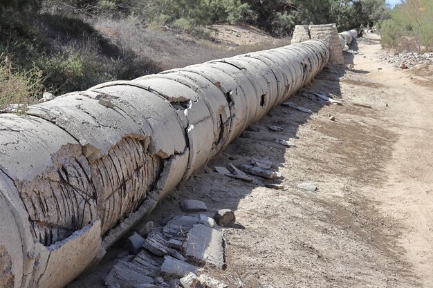 Old abandoned and deteriorated cement pipeline