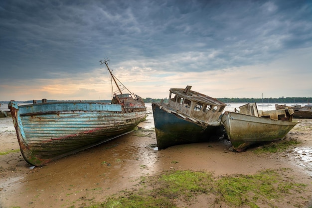 Old abandoned fishing boats on the River Orwell