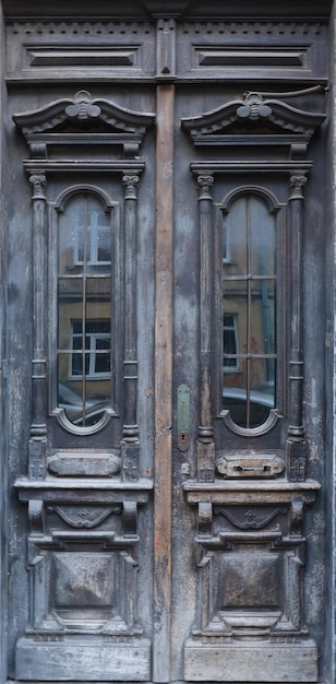 Old ancient wooden door texture in european medieval style