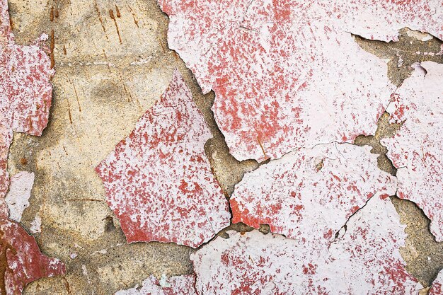 Old antiquity street wall with dust and scratched grunge textures with paint stains