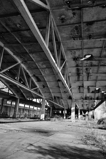 Old arched metal structures abandoned air hangar