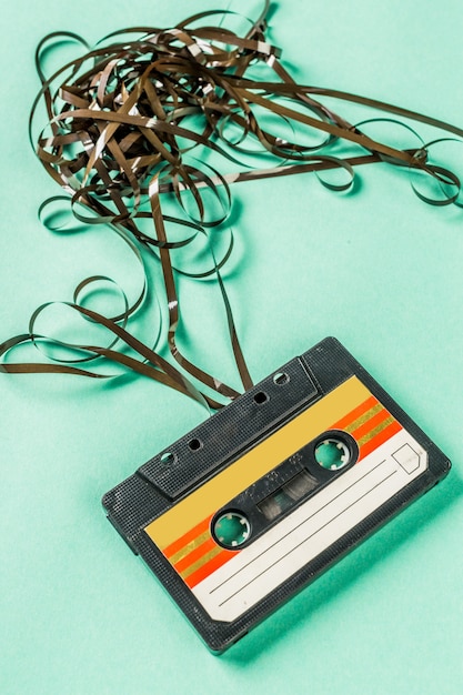 Old audio cassettes on turquoise 