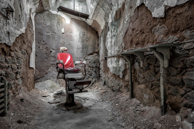 old barber chair in abandoned building