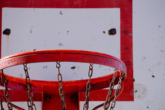Photo old basketball hoop in the street