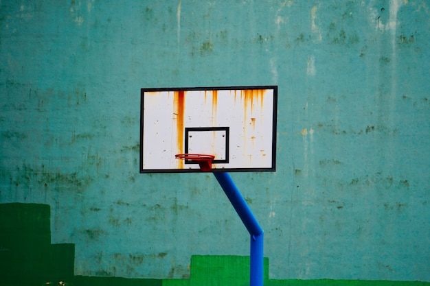 old basketball hoop in the street