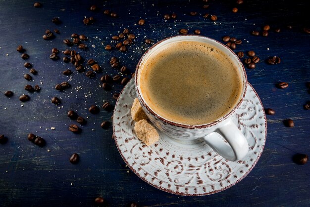 Old beauty cup with fragrant coffee