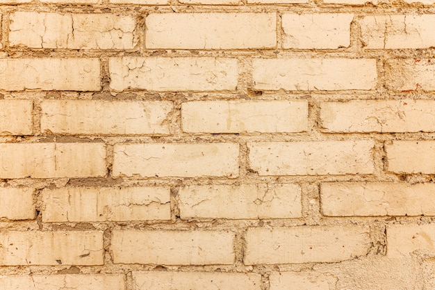 Old beige brick wall. Close-up. spaces and textures. Space for text.