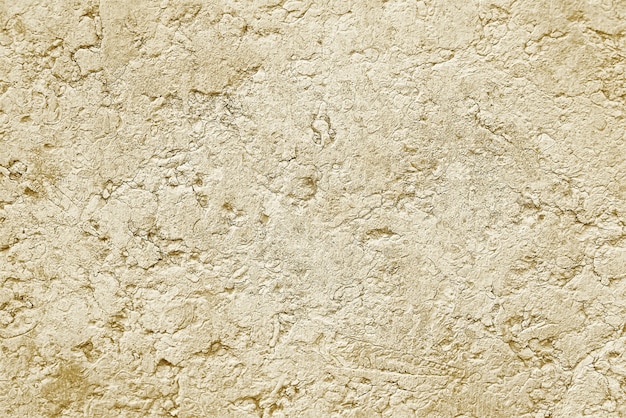 Old beige stone concrete wall background texture