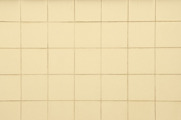 Old beige tile wall texture