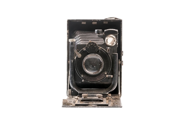 Foto vecchia macchina fotografica a soffietto su uno sfondo bianco isolato