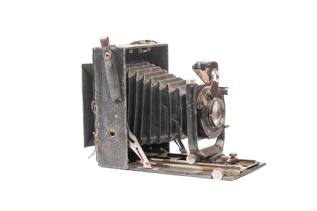 Old bellows camera on a white background Isolated