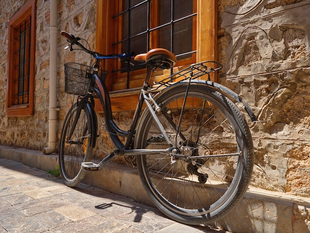 An old bicycle parked on the street