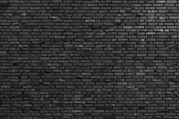 Photo old black brick wall background