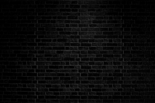 Photo old black brick wall texture background