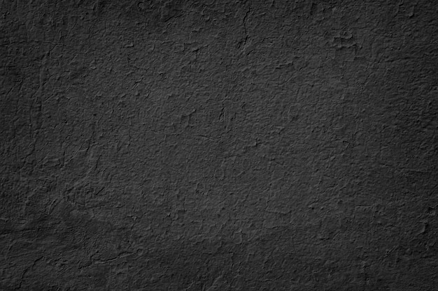 Старый черный гранж-фон. Текстура темной бетонной стены