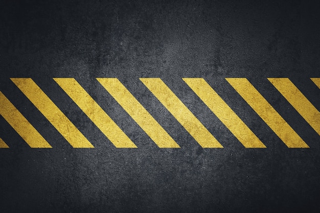 Photo old black grungy metal background with yellow warning stripes