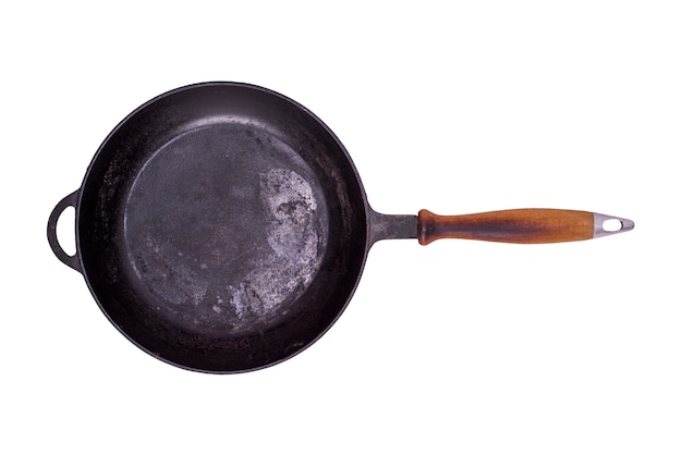 Old black round cast-iron frying pa