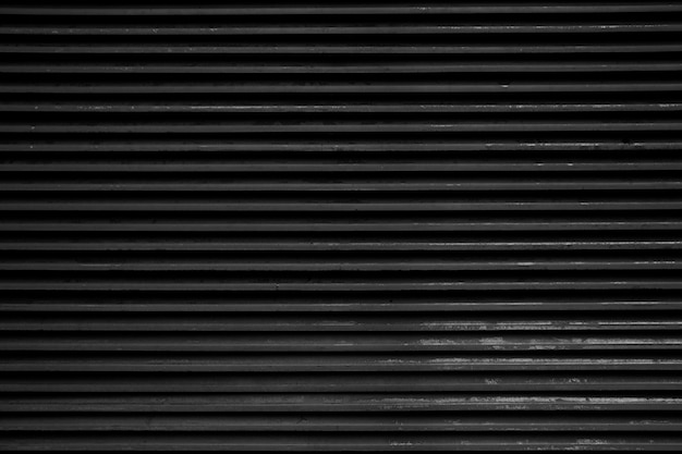 Old black striped background. Grunge wallpaper