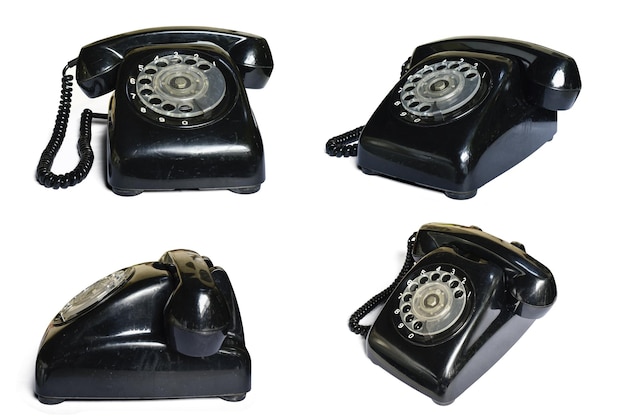 Photo old black telephone on white backgroundantique objectclipping path