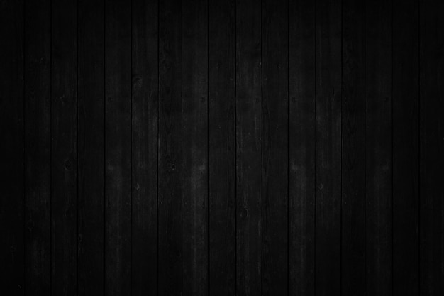 Old black wooden background. Grunge wallpaper