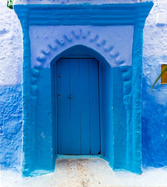 Old blue door on street in Chefchaouen