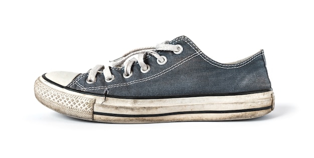 Old blue generic sneaker isolated