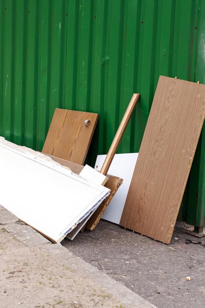 Old boards in a garbage dump closeup