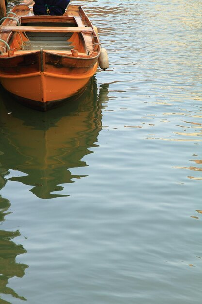 Old boat on the water in Venice Italy