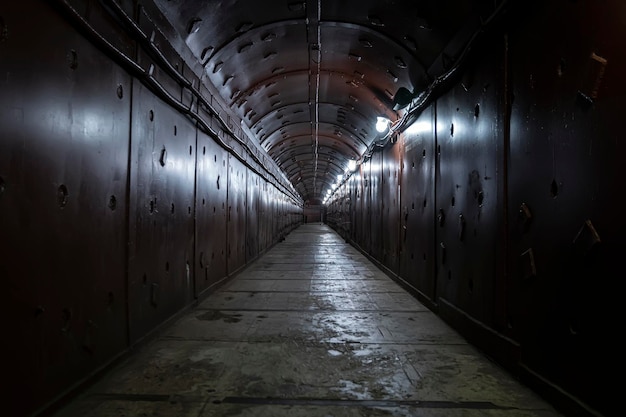 An old bomb shelter tunnel in an underground bunker. protection\
from bombardment.