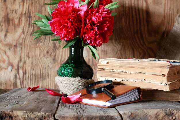 Old book flower on wooden table