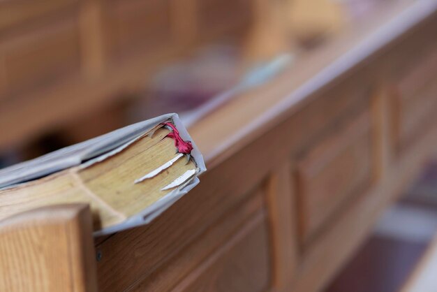 an old book on a shelf in a church