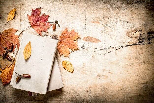 Old books and autumn leaves