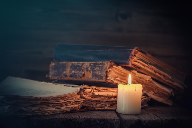 Old books and candle