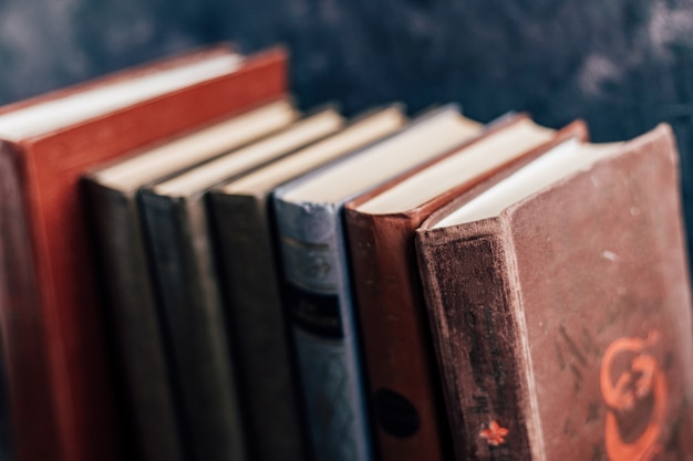 Old books on the shelf selective focus.