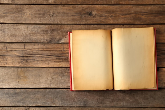 Old books on wooden background