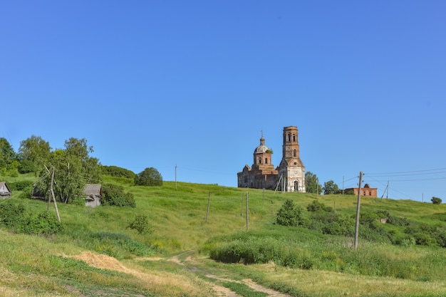 old brick abandoned orthodox church abandoned  church in the village abandoned red brick church