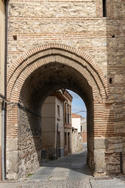 Old brick arch with entrance to the city