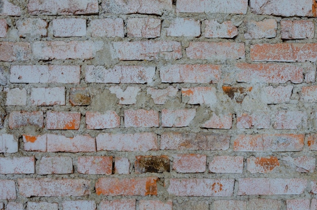 Photo old brick painted wall.